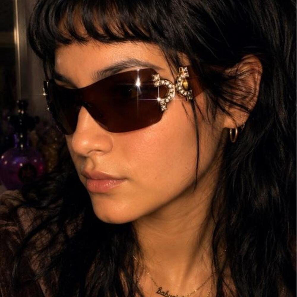 Brown shield sunglasses featuring oversized rimless lenses rhinestone luxe y2k